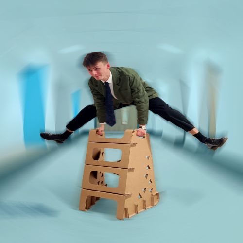 Man jumping over a set of brown steps Man jumping over a set of brown steps