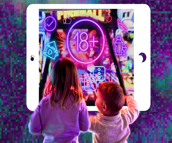 Two small children in front of a laptop with colourful images on it depicting age restricted content