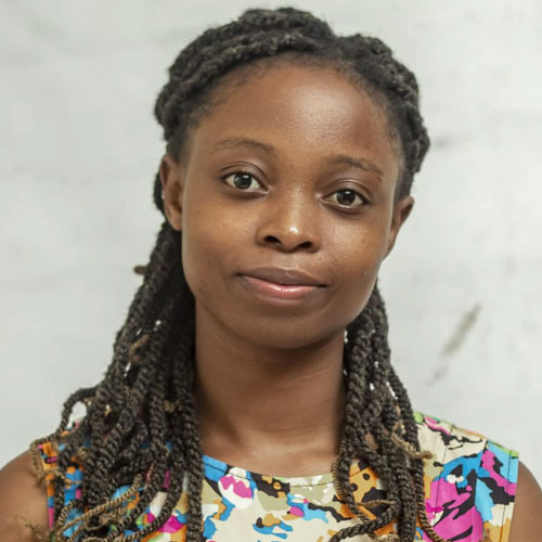 Monica Nzanga smiling at the camera Monica Nzanga smiling at the camera