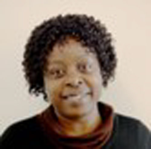 Professor Christabel Kambala smiling at the camera Professor Christabel Kambala smiling at the camera