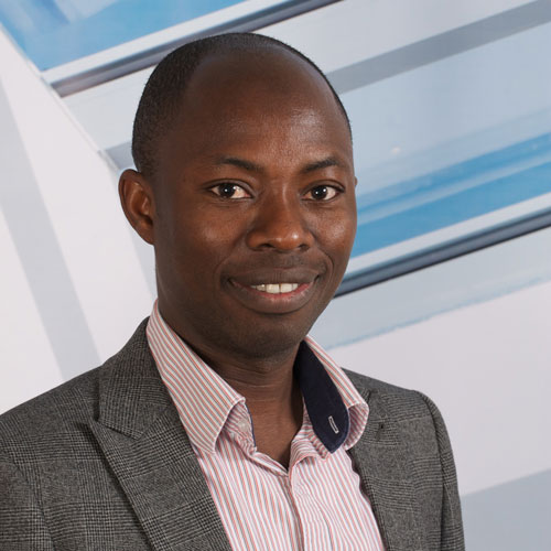 Dr Edward Sosu smiling at the camera Dr Edward Sosu smiling at the camera