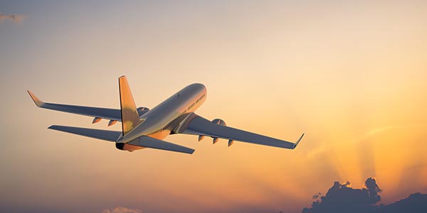 Aeroplane taking off into sunset Aeroplane taking off into sunset