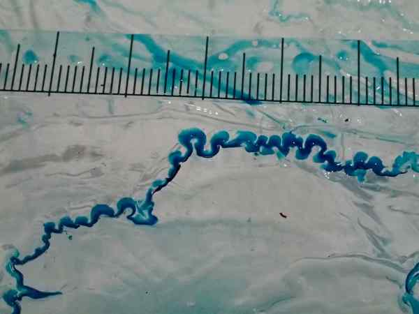 A miniature model of a meltwater channel over an ice block A miniature model of a meltwater channel over an ice block